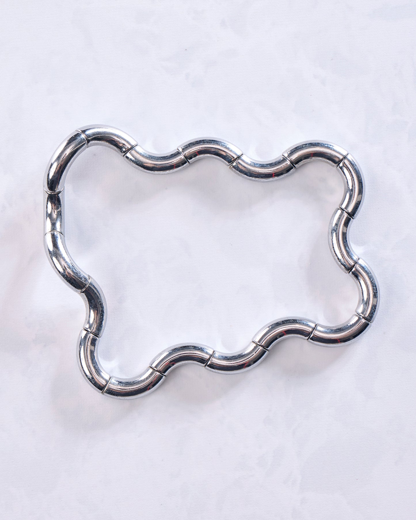 Silver - Tangle® Kinetic Metal Sculpture - Tangle, Inc.