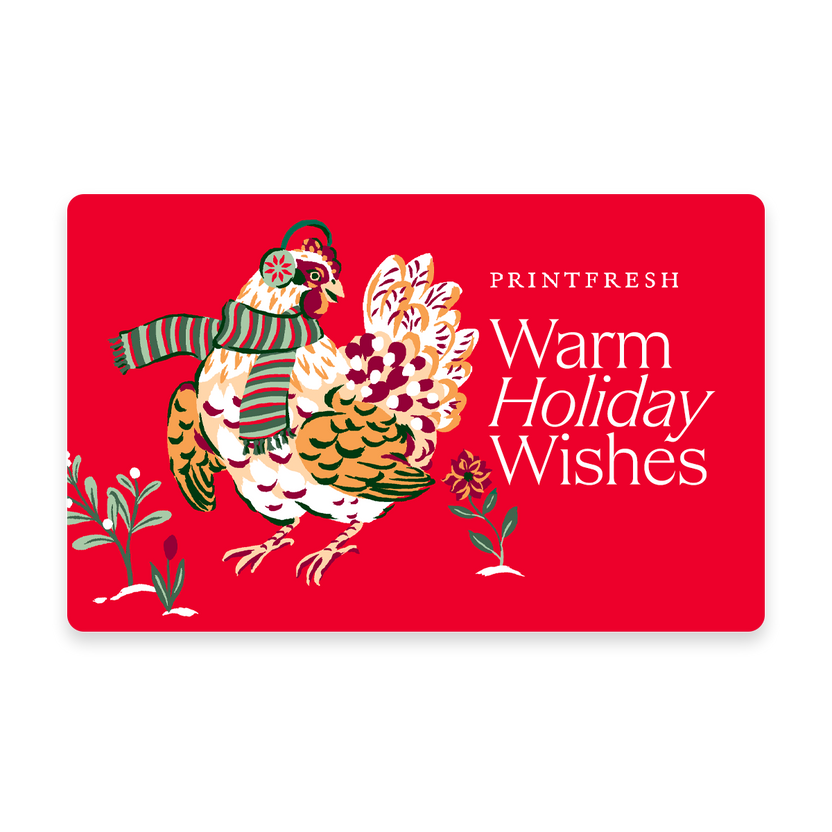 Red illustrated gift card featuring a bird wearing a striped scarf and the message “Warm Holiday Wishes.”