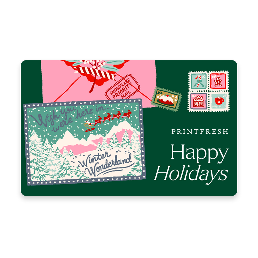 Green illustrated gift card featuring holiday mail and a winter landscape with the message “Happy Holidays.”