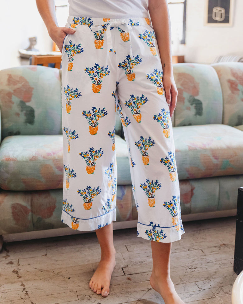 Raina is 5'8" and wears size S in Lemon Tree - Cropped Pajama Pants - Cloud